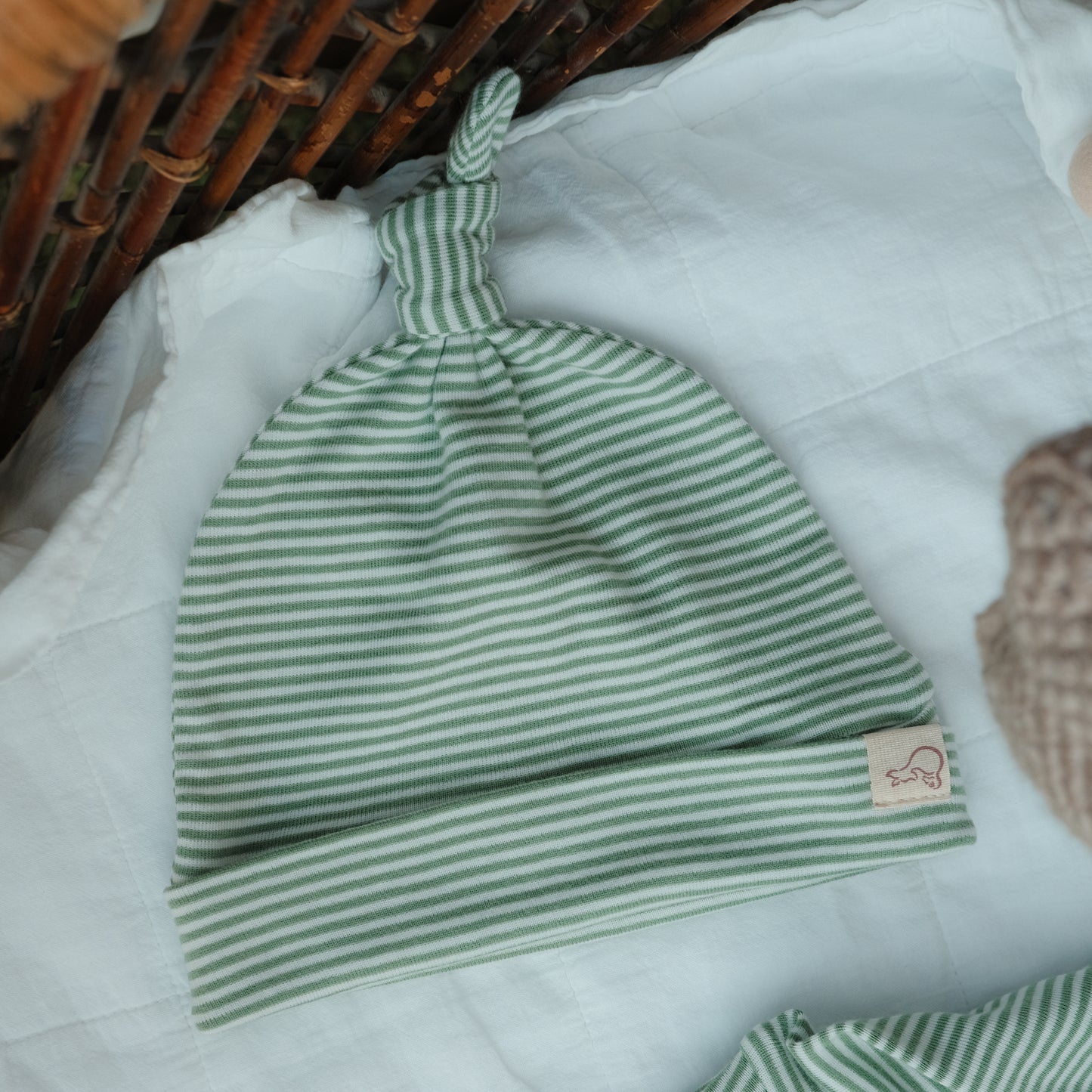 Knotted Hat in Palm Mist